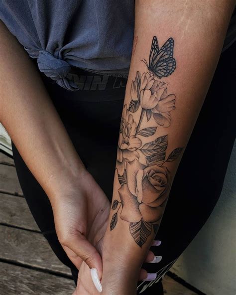 flowers tattoos on arm